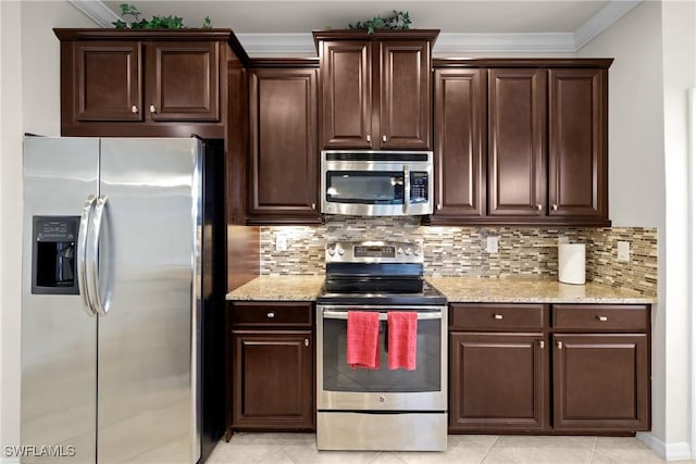 kitchen with appliances with stainless steel finishes, backsplash, light stone counters, and ornamental molding