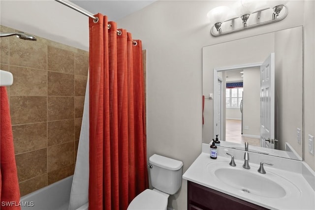 full bathroom with toilet, vanity, and shower / tub combo with curtain