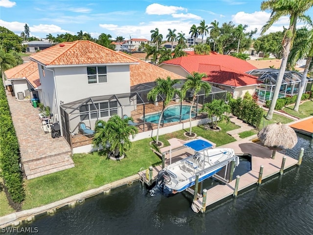 drone / aerial view with a water view