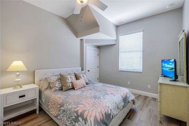 bedroom featuring ceiling fan and wood-type flooring