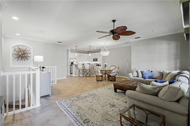 tiled living room featuring ceiling fan and ornamental molding