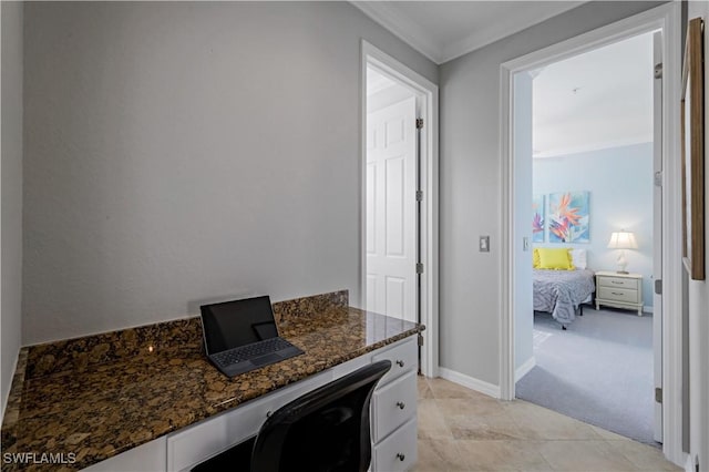 bathroom with tile patterned flooring, vanity, and crown molding