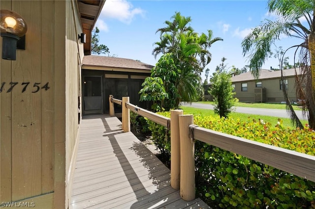 wooden terrace with central air condition unit