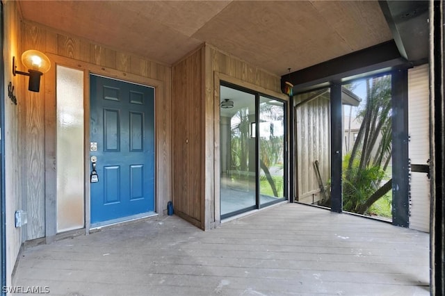 doorway to property featuring a wooden deck