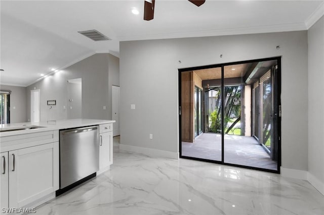 kitchen featuring white cabinetry, dishwasher, ceiling fan, crown molding, and lofted ceiling