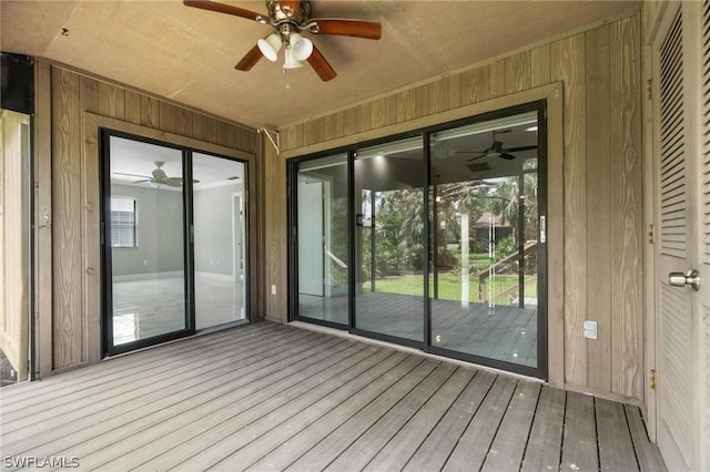 unfurnished sunroom featuring wood ceiling