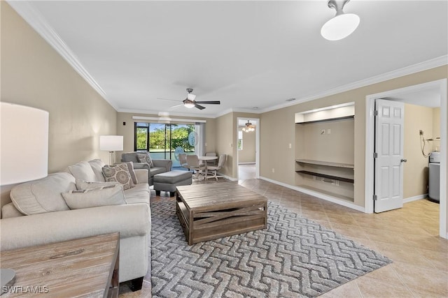 tiled living room featuring crown molding, built in features, baseboards, and a ceiling fan