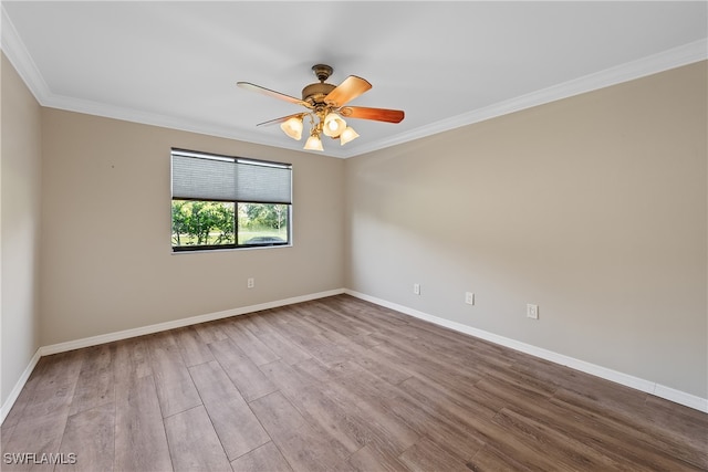 unfurnished room with ceiling fan, light hardwood / wood-style flooring, and crown molding