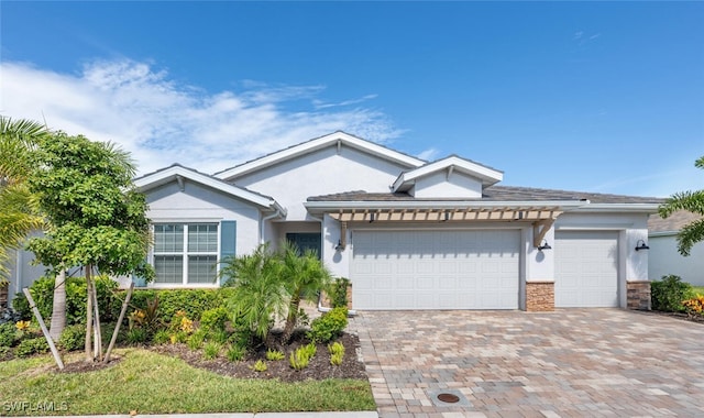 view of front of property with a garage