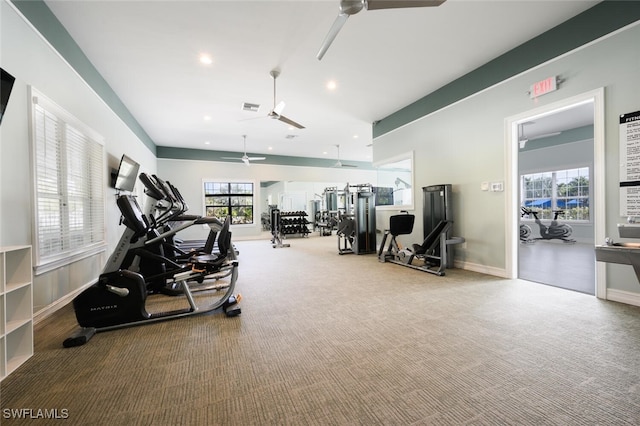 workout area with ceiling fan and carpet floors