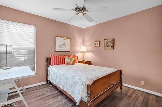 bedroom with ceiling fan and hardwood / wood-style floors