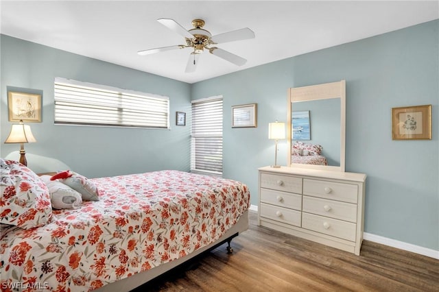 bedroom featuring ceiling fan and hardwood / wood-style floors