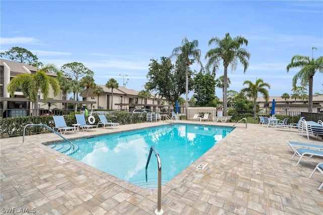 view of swimming pool featuring a patio