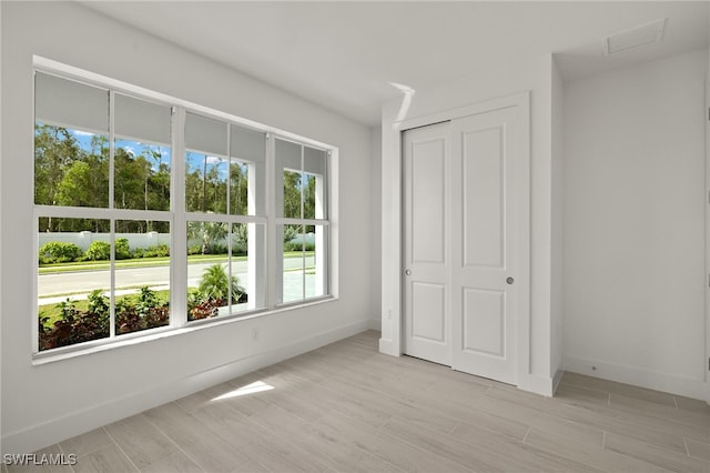 unfurnished bedroom featuring a closet