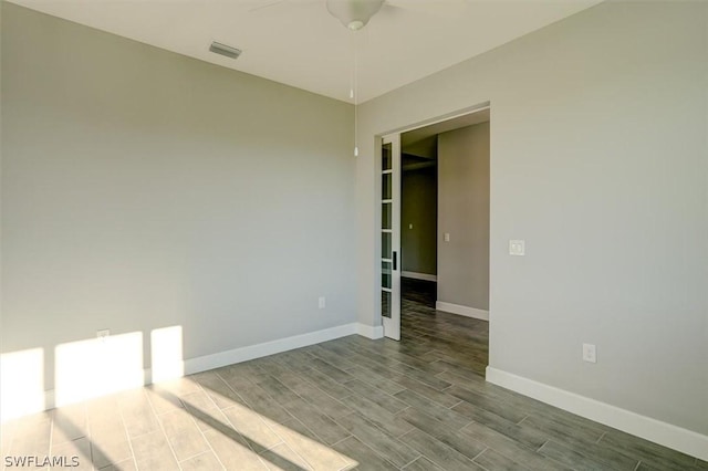 unfurnished room with ceiling fan