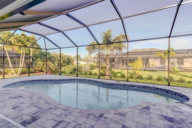 view of pool featuring a lanai and a patio area