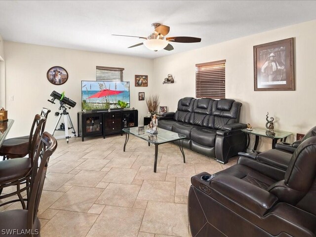 living room featuring ceiling fan