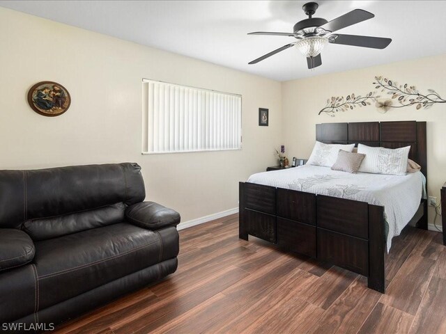 bedroom featuring dark wood-type flooring and ceiling fan