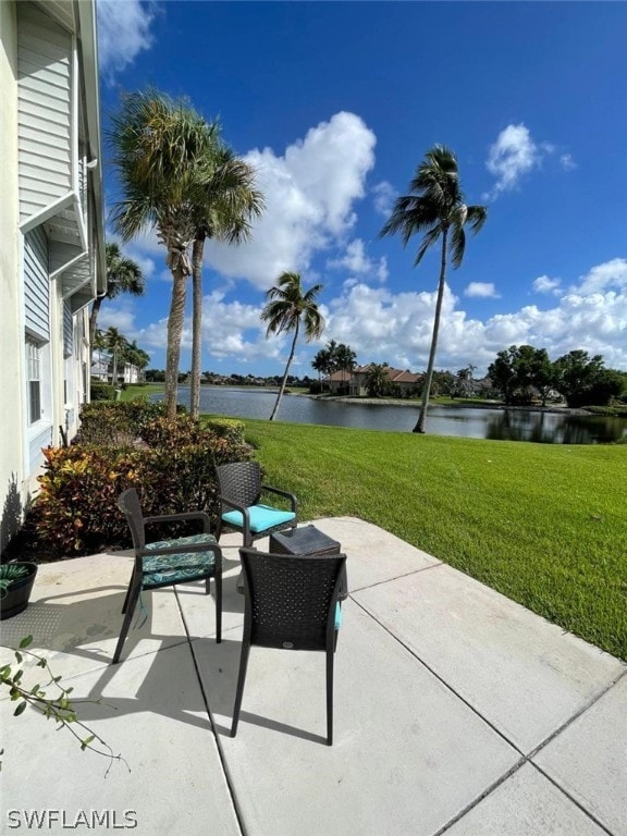 view of patio / terrace with a water view