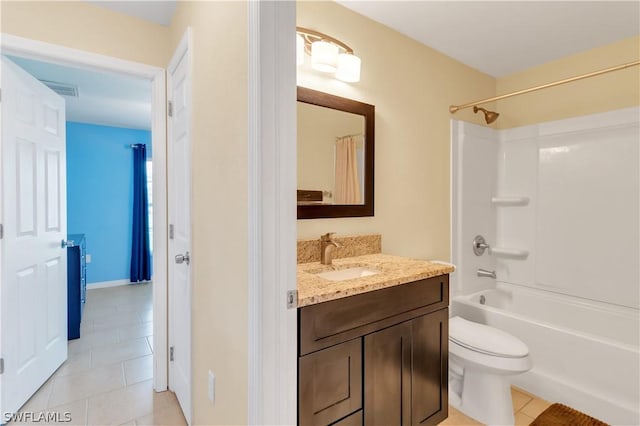 full bathroom with tile patterned flooring, vanity, toilet, and bathing tub / shower combination