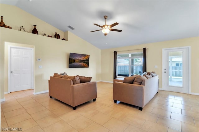 tiled living room featuring ceiling fan and lofted ceiling