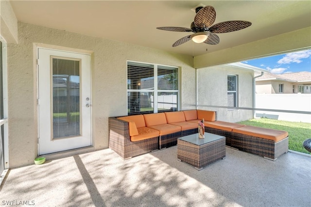 view of patio with ceiling fan and an outdoor hangout area