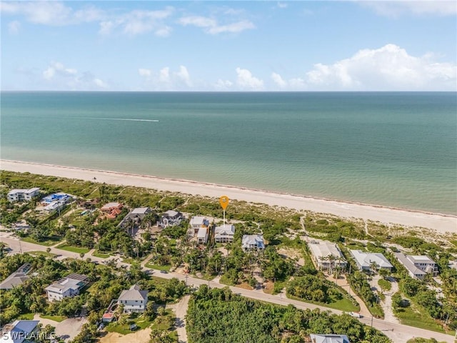 aerial view with a beach view and a water view