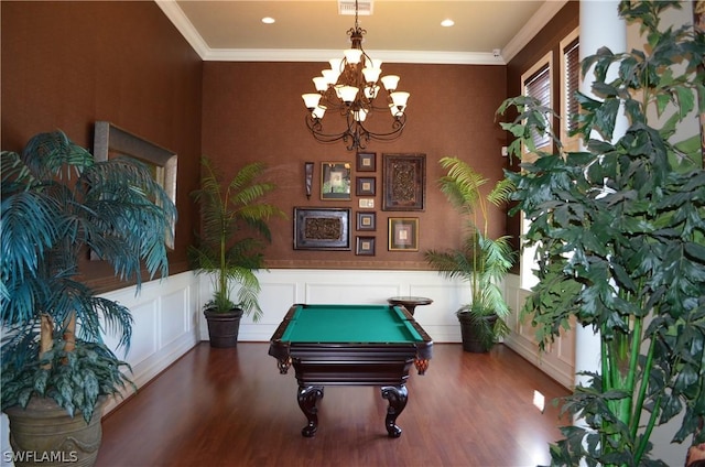 game room with crown molding, dark hardwood / wood-style flooring, a notable chandelier, and billiards