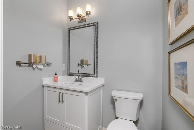 half bath with toilet and vanity