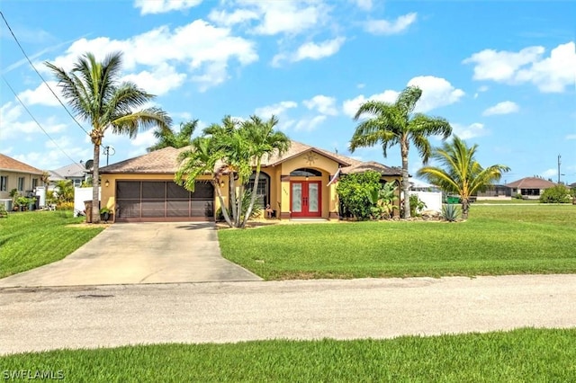 view of front of house featuring a front lawn and french doors