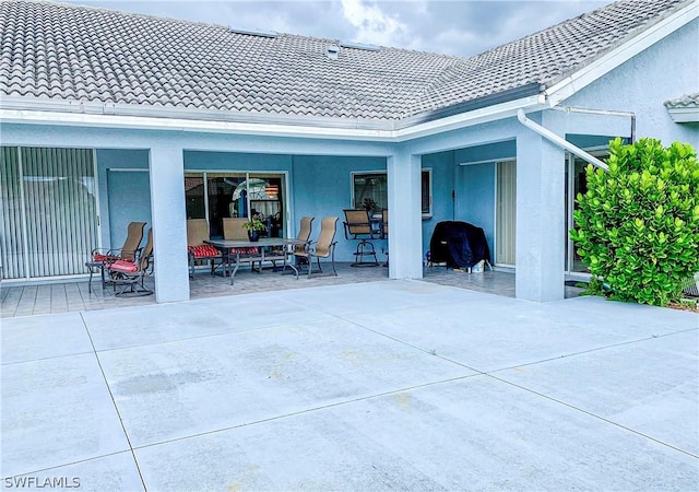 view of patio featuring outdoor dining space