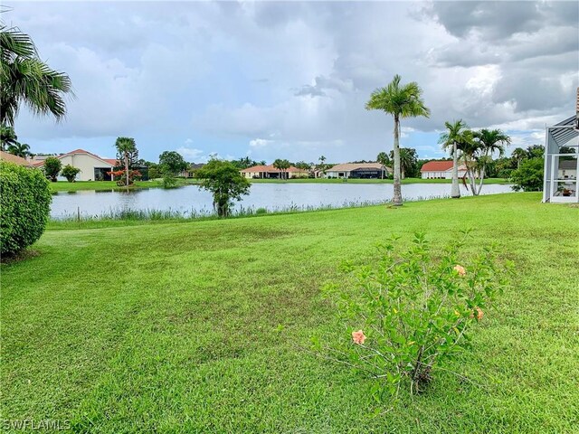 view of yard with a water view