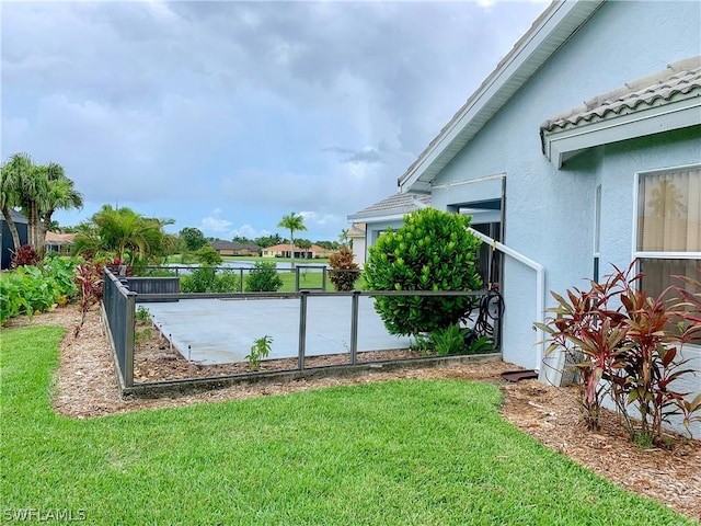 view of yard with fence