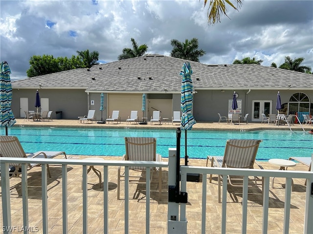 view of swimming pool featuring a patio