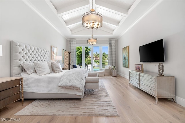 bedroom featuring vaulted ceiling with beams, a chandelier, and light wood-type flooring