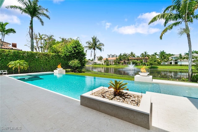 view of swimming pool with a water view