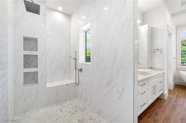 171 N St, Naples, FL 34108 - full bath featuring a marble finish shower, wood finished floors, vanity, a tub to relax in, and recessed lighting