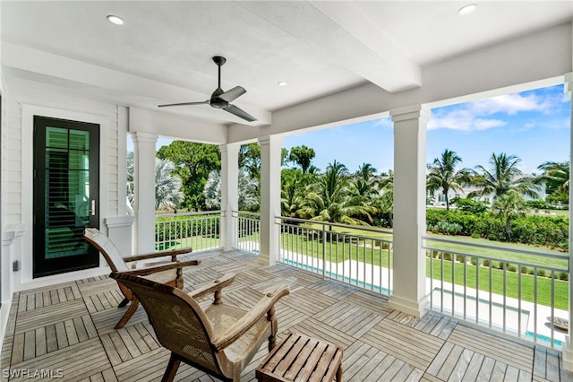 wooden terrace with ceiling fan