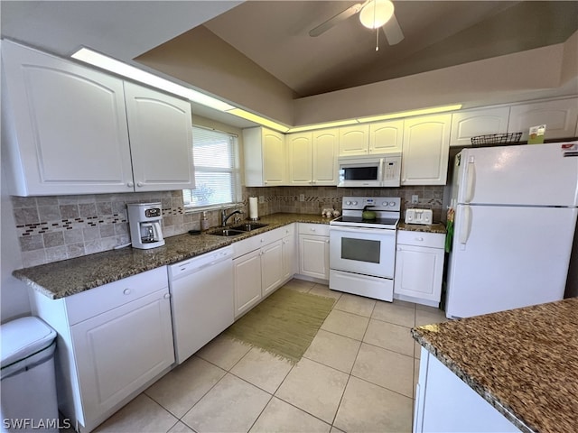 kitchen with light tile flooring, backsplash, ceiling fan, sink, and white appliances