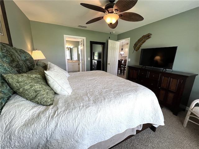 carpeted bedroom featuring connected bathroom and ceiling fan