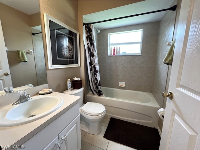 full bathroom featuring tile flooring, toilet, oversized vanity, and shower / bath combo with shower curtain