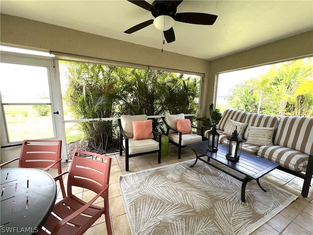 sunroom / solarium with ceiling fan