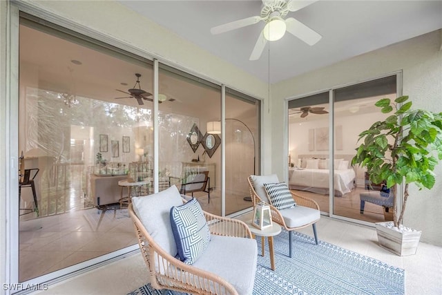1732 Tarpon Bay Dr S Unit 203, Naples, FL 34119 - sunroom / solarium featuring a ceiling fan