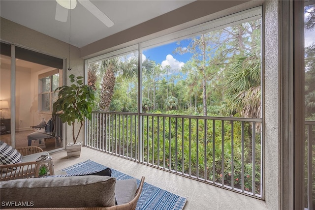 sunroom / solarium with ceiling fan