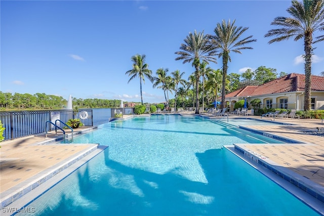 view of swimming pool with a patio area