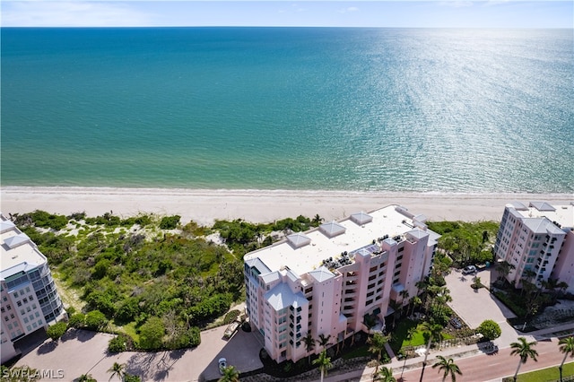 aerial view featuring a water view and a view of the beach