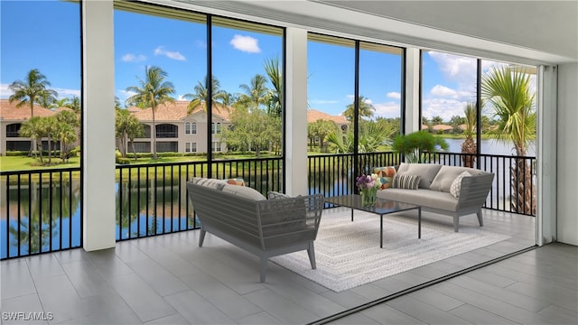 sunroom with a water view