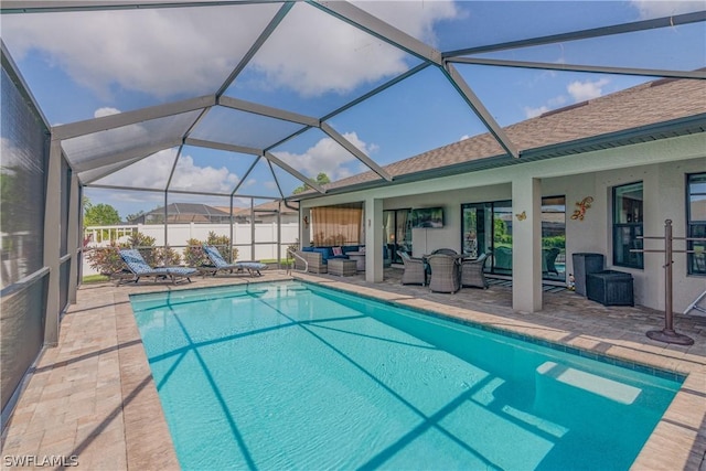 view of pool with an outdoor hangout area, a lanai, and a patio area