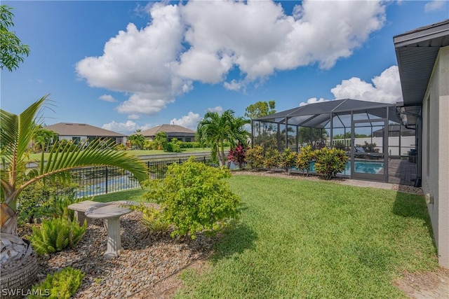 view of yard featuring a lanai