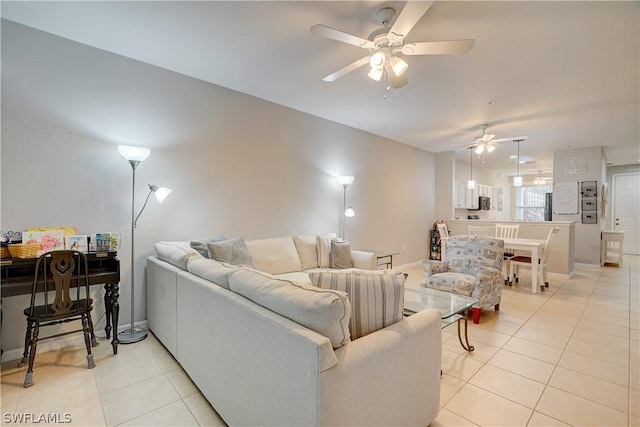 tiled living room with ceiling fan